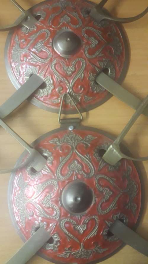 ANTIQUES and COLLECTABLES: 4 FOUR  HANDCRAFTED DECORATIVE BRASS INDIAN SHIELDS WITH SWORDS