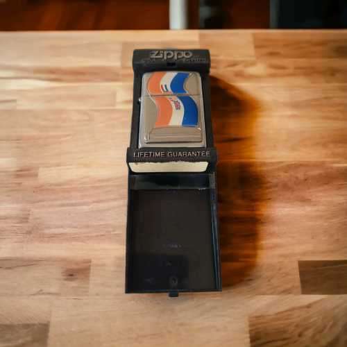 Rare collectors silver Zippo lighter with Old South Africa Flag emblem never been used