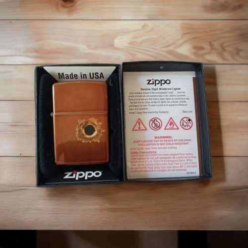 Stunning rare vintage collectors Zippo lighter with bullet hole impression never been used