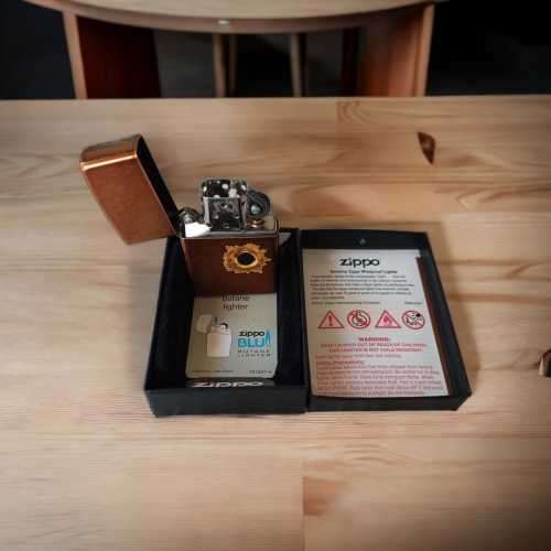 Stunning rare vintage collectors Zippo lighter with bullet hole impression never been used