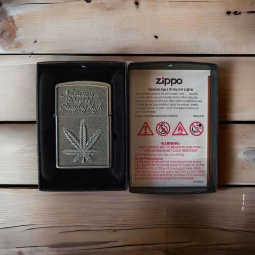 Stunning rare collectors Zippo lighter with the green leaf emblem with original casing