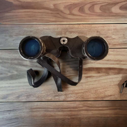 Collectors binoculars with leather carry case