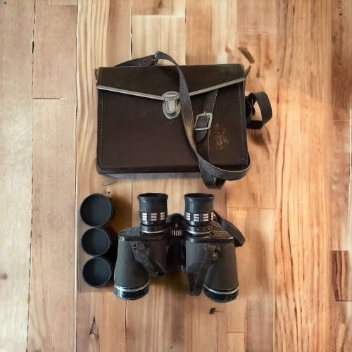 Collectors binoculars with leather carry case