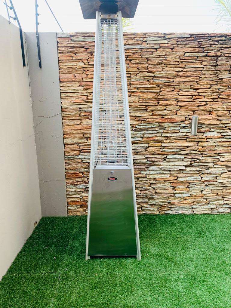 Totai Stainless Steel Patio Heater on wheels and a 9kg Gas bottle