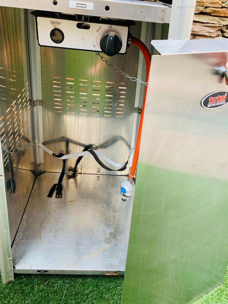 Totai Stainless Steel Patio Heater on wheels and a 9kg Gas bottle