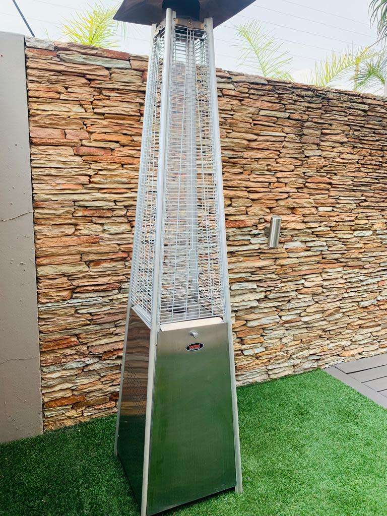 Totai Stainless Steel Patio Heater on wheels and a 9kg Gas bottle