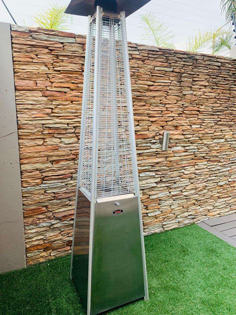 Totai Stainless Steel Patio Heater on wheels and a 9kg Gas bottle