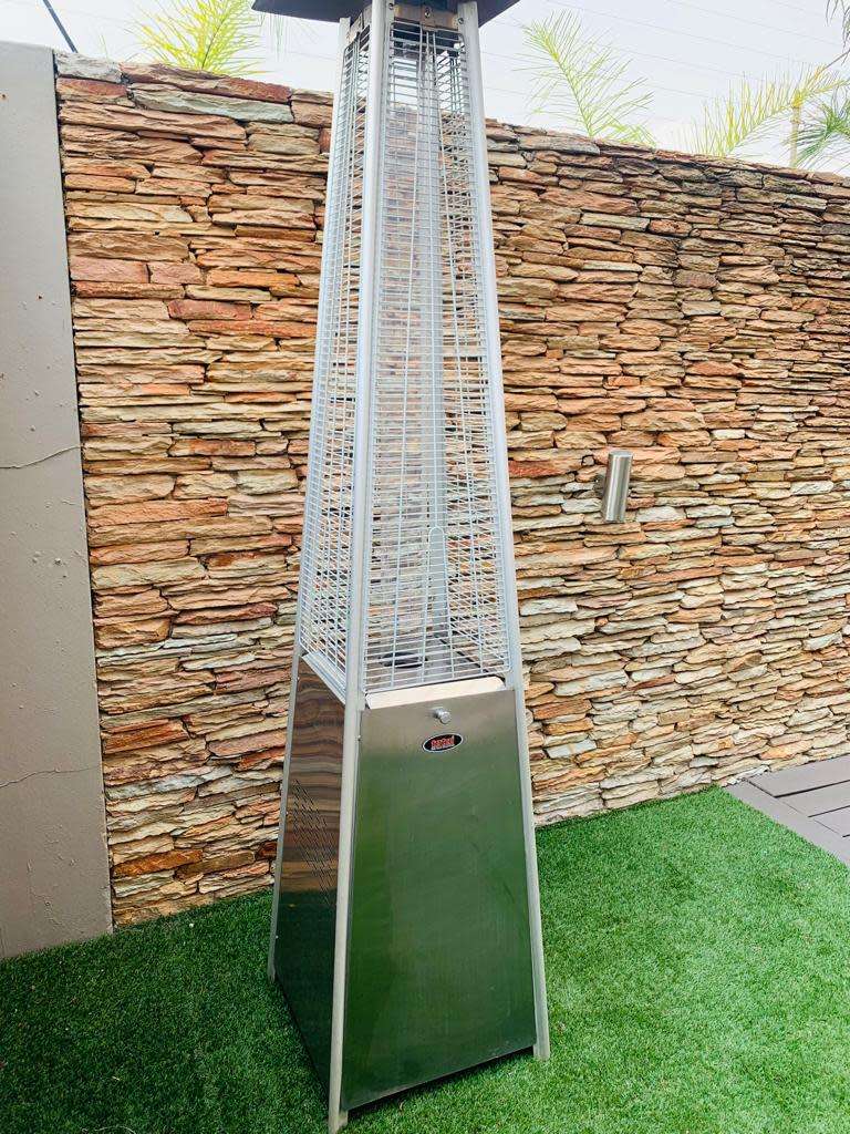 Totai Stainless Steel Patio Heater on wheels and a 9kg Gas bottle