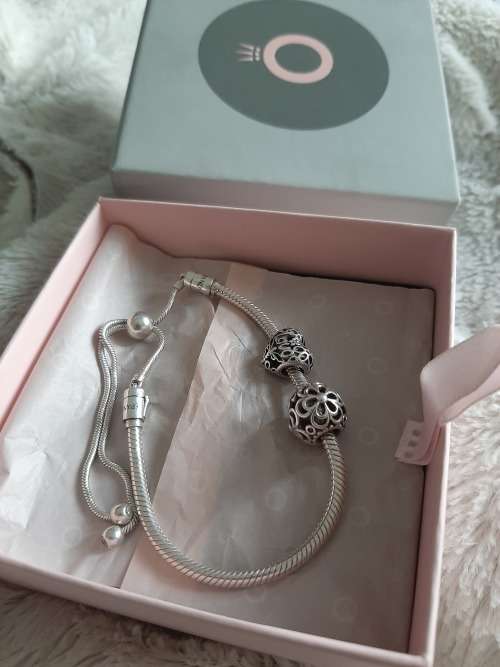 PANDORA ADJUSTABLE BRACELET WITH CHARMS