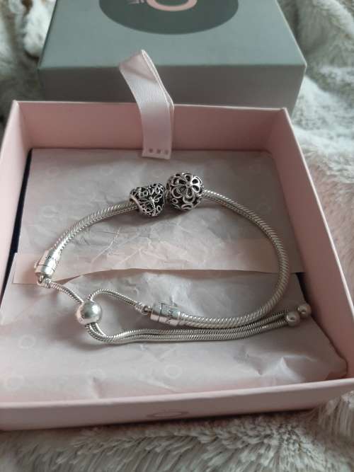 PANDORA ADJUSTABLE BRACELET WITH CHARMS