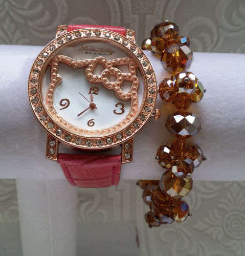 On Crazy Auction - Hello Kitty Watch Hot Pink Leatherette strap with Rhinestones all around the face