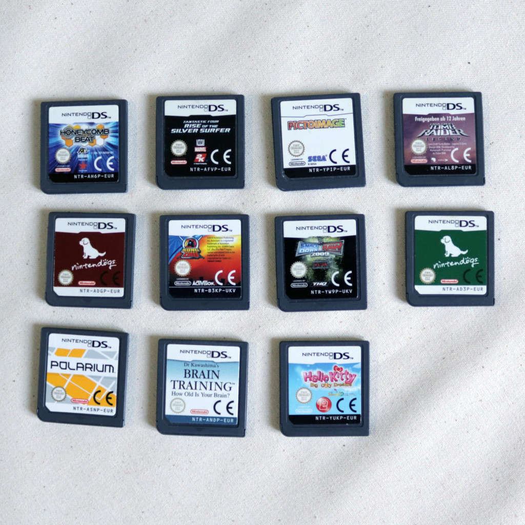Lot of 11 Loose Nintendo DS Games - Nintendogs, Brain Training, Tomb Raider Legend, Smackdown vs Raw