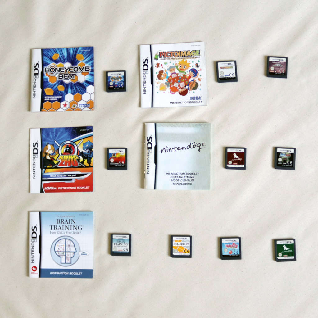 Lot of 11 Loose Nintendo DS Games - Nintendogs, Brain Training, Tomb Raider Legend, Smackdown vs Raw