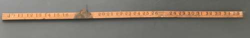 old vintage wooden folding ruler
