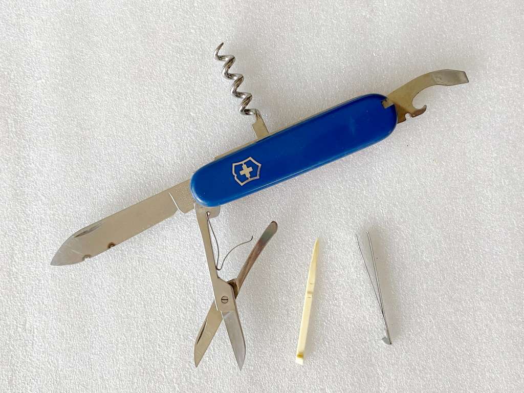 Victorinox Officier Suisse , blue and red cover, vintage pocket knife,Switzerland, collectors item