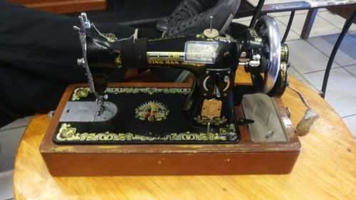 Antique Flying Man Hand Crank Sewing Machine
