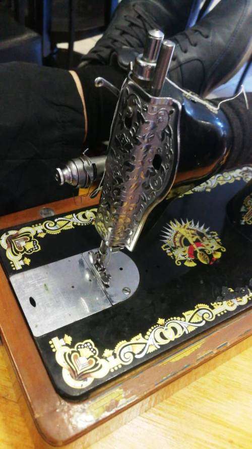 Antique Flying Man Hand Crank Sewing Machine