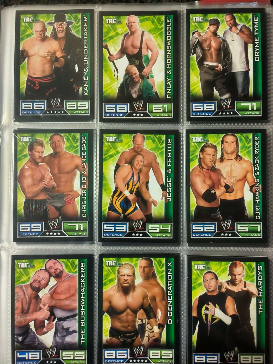 Lot of WWE cards including binder and playmat
