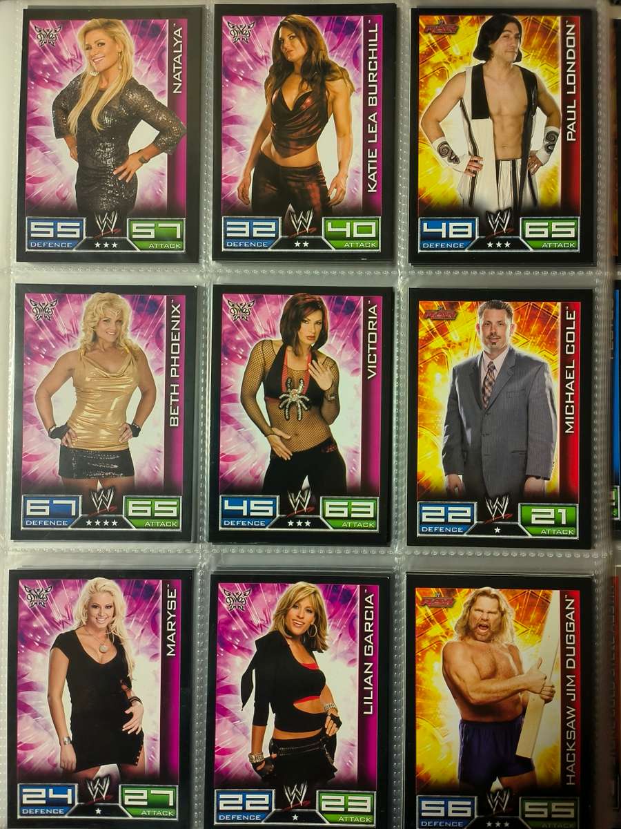 Lot of WWE cards including binder and playmat