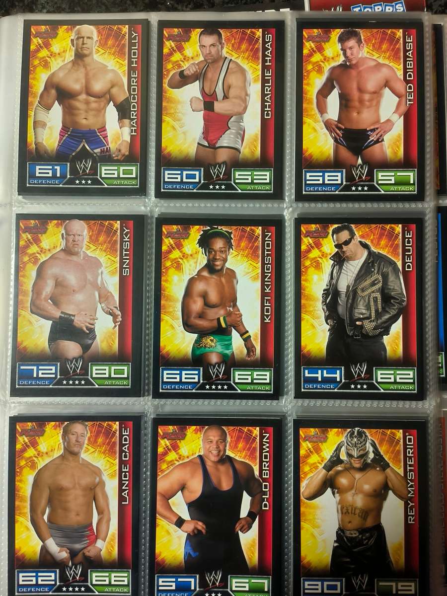 Lot of WWE cards including binder and playmat