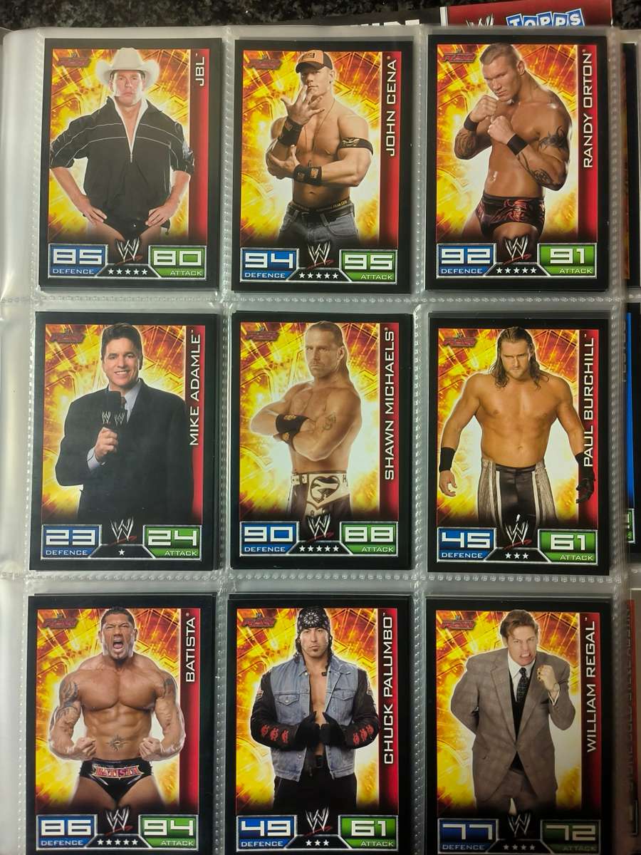 Lot of WWE cards including binder and playmat