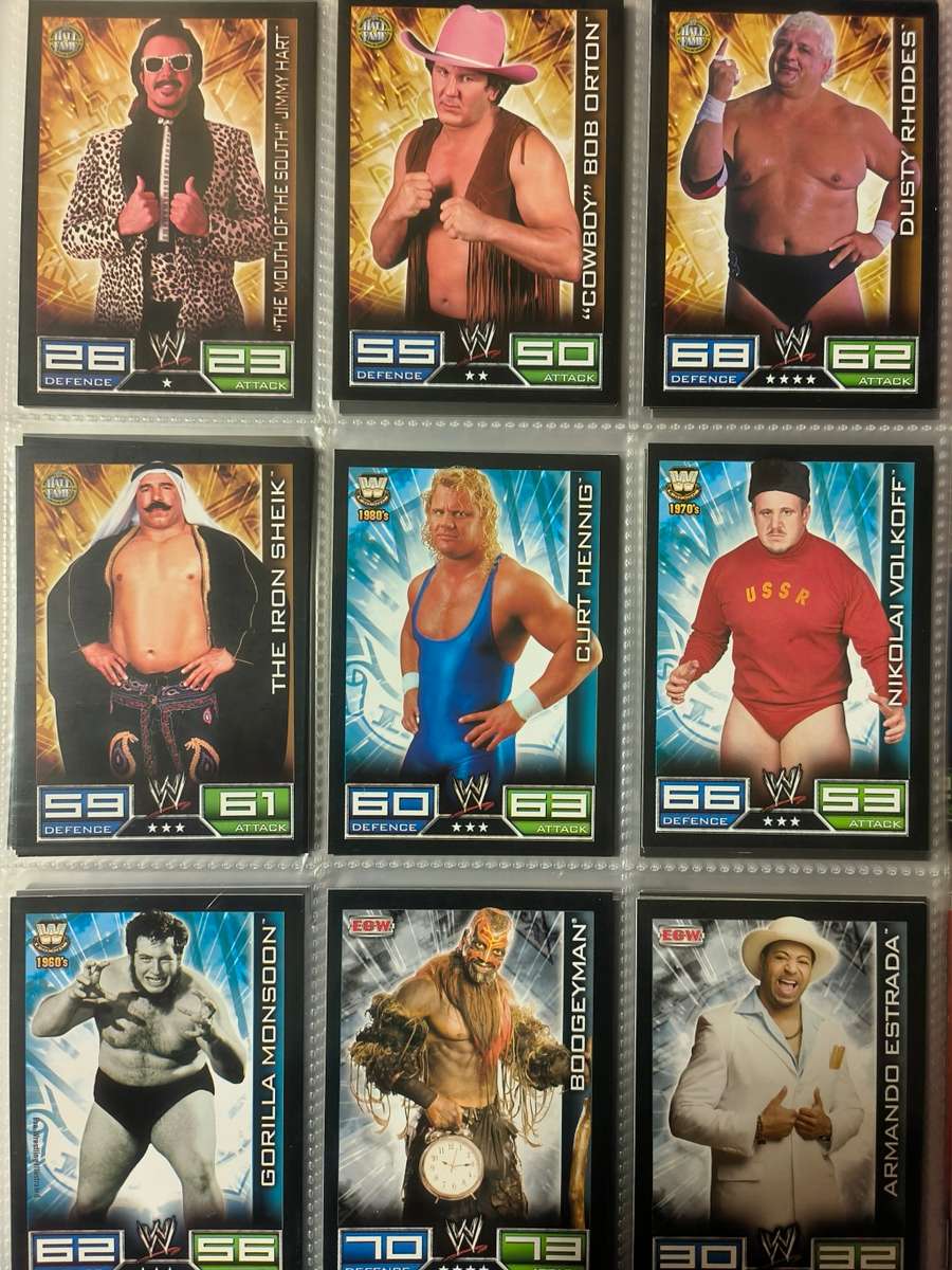 Lot of WWE cards including binder and playmat