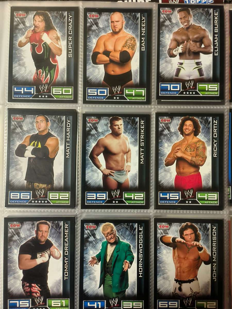 Lot of WWE cards including binder and playmat