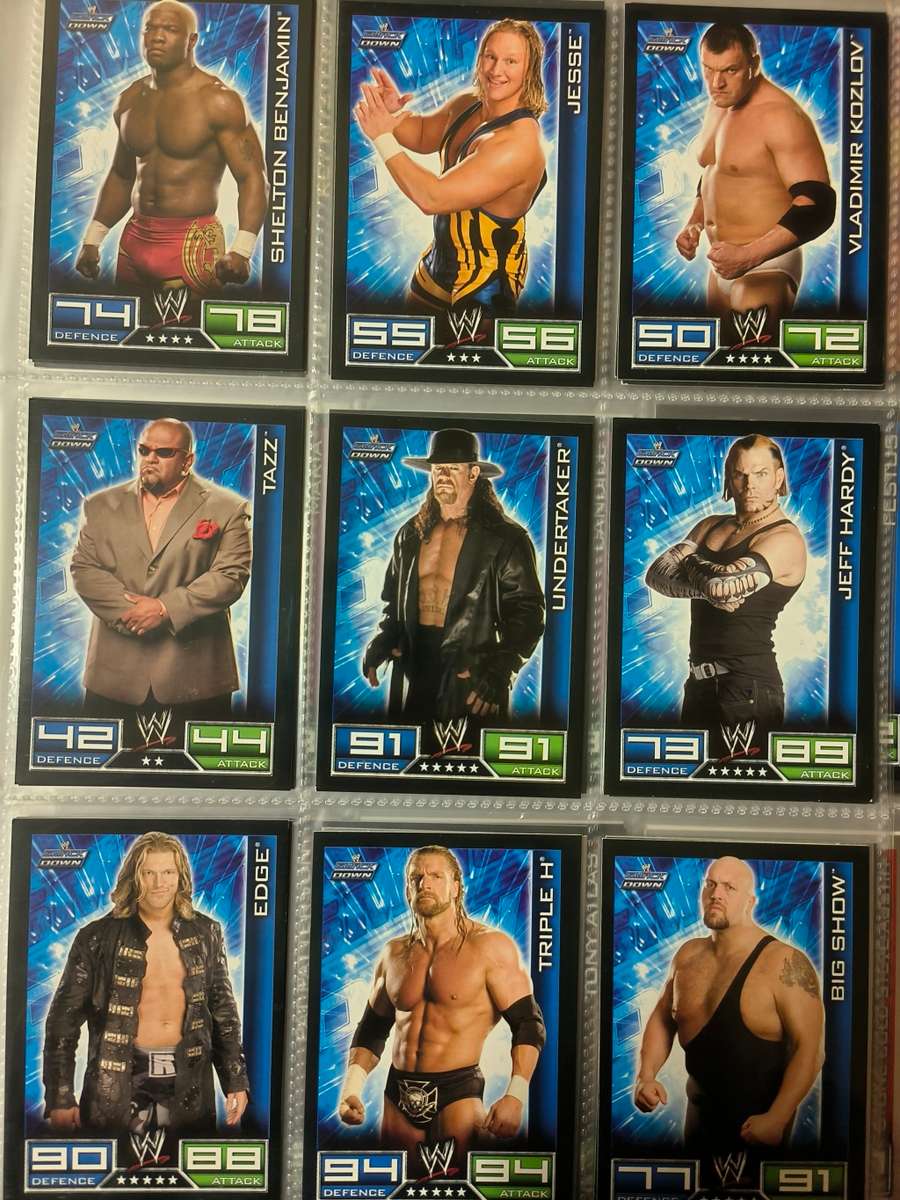 Lot of WWE cards including binder and playmat