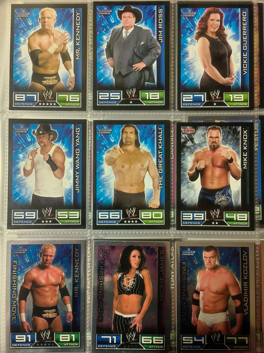 Lot of WWE cards including binder and playmat