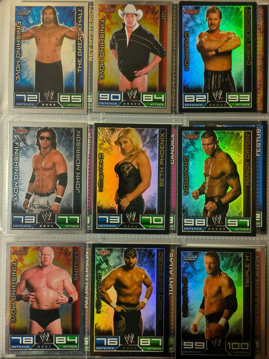 Lot of WWE cards including binder and playmat
