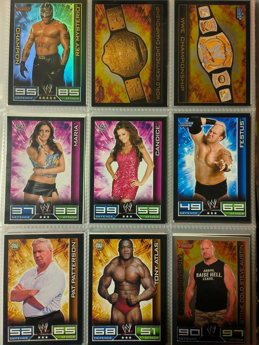 Lot of WWE cards including binder and playmat
