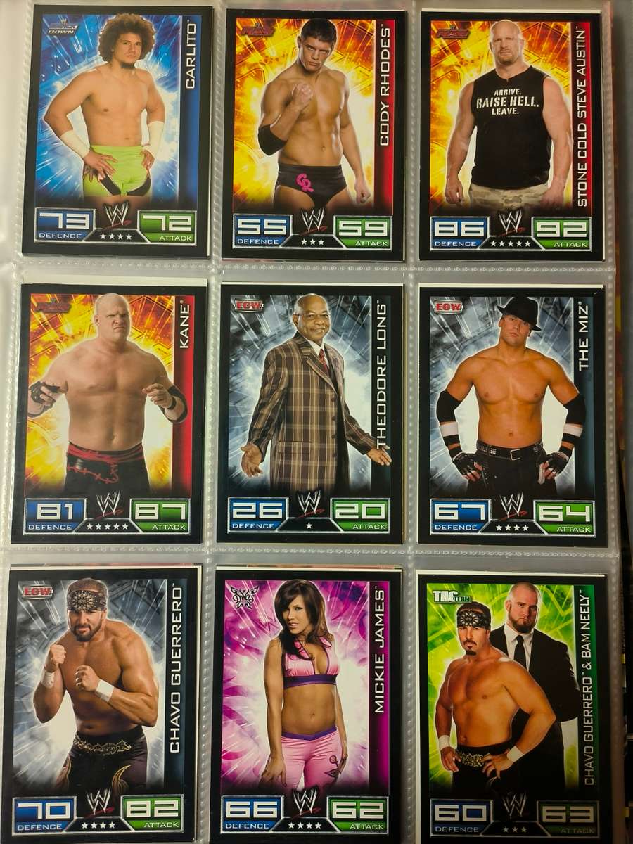 Lot of WWE cards including binder and playmat