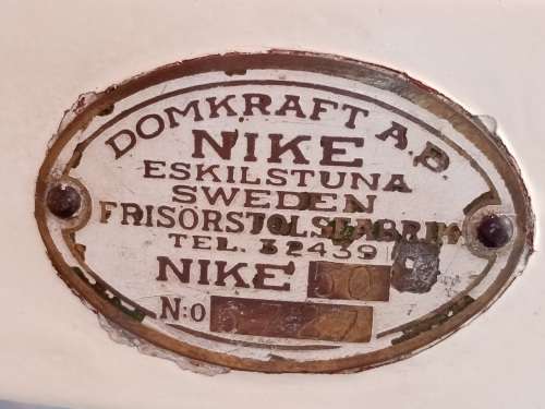 Nike Vintage Barber Chair -  circa: 1940's - 1950's