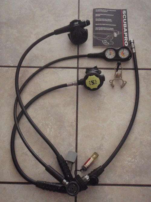 Scubapro MK25 DIN X650/ R390 with Scubapro analog depth/pressure gauge.