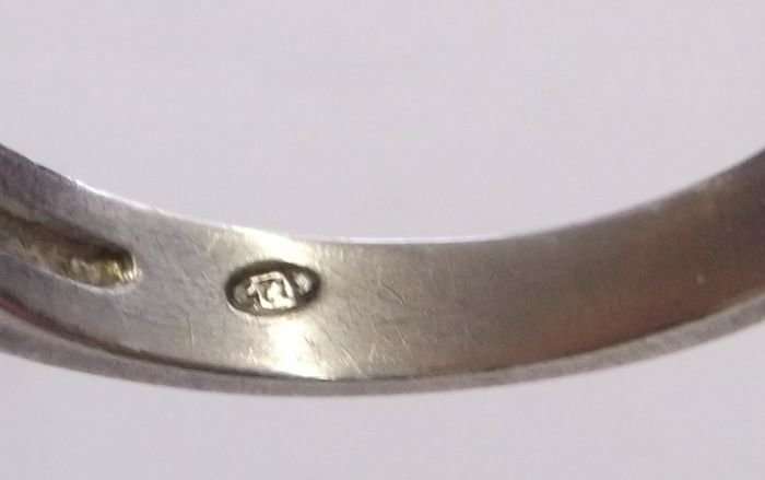 A PETITE AND BEAUTIFUL SOLID STERLING SILVER RING SET WITH FACETED STONES...A M A Z I N G !!!!