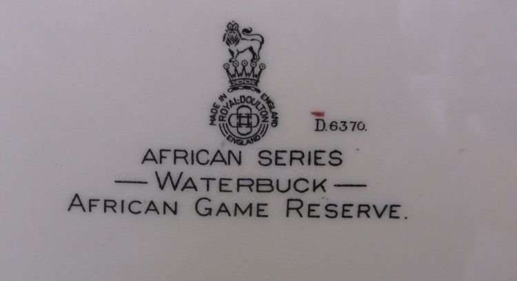 A HUGE DISPLAY PLATE BY ROYAL DOULTON DEPICTING THE WATERBUCK - AFRICAN SERIES