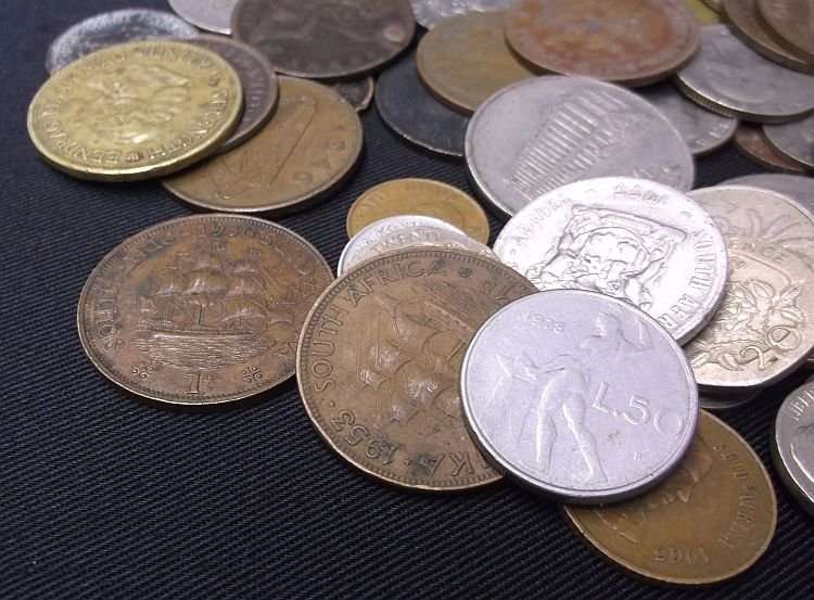 100 COINS FROM ALL AROUND THE WORLD ....MAJORITY SOUTH AFRICAN....BID PER COIN TO TAKE ALL