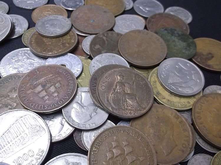 100 COINS FROM ALL AROUND THE WORLD ....MAJORITY SOUTH AFRICAN....BID PER COIN TO TAKE ALL