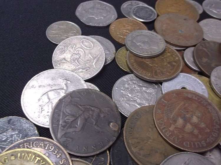 100 COINS FROM ALL AROUND THE WORLD ....MAJORITY SOUTH AFRICAN....BID PER COIN TO TAKE ALL