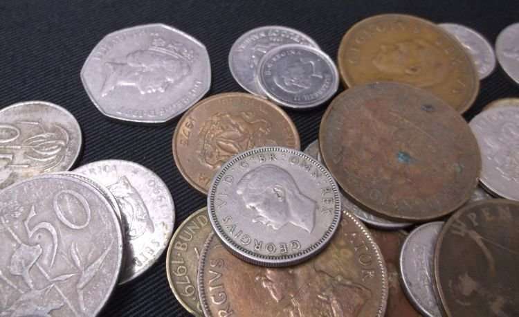 100 COINS FROM ALL AROUND THE WORLD ....MAJORITY SOUTH AFRICAN....BID PER COIN TO TAKE ALL