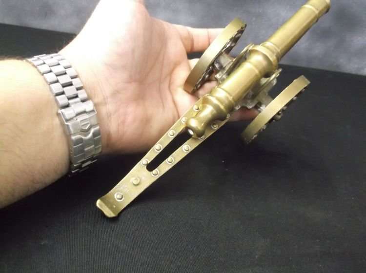 A WELL MADE AND DETAILED VINTAGE SOLID BRASS CANON ORNAMENT ....KA POW !!
