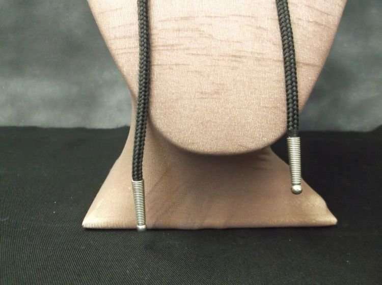 A LUCKY VINTAGE BOLO TIE WITH HORSE AND HORSESHOE MOTIF....COWBOY ACCESSORY !!