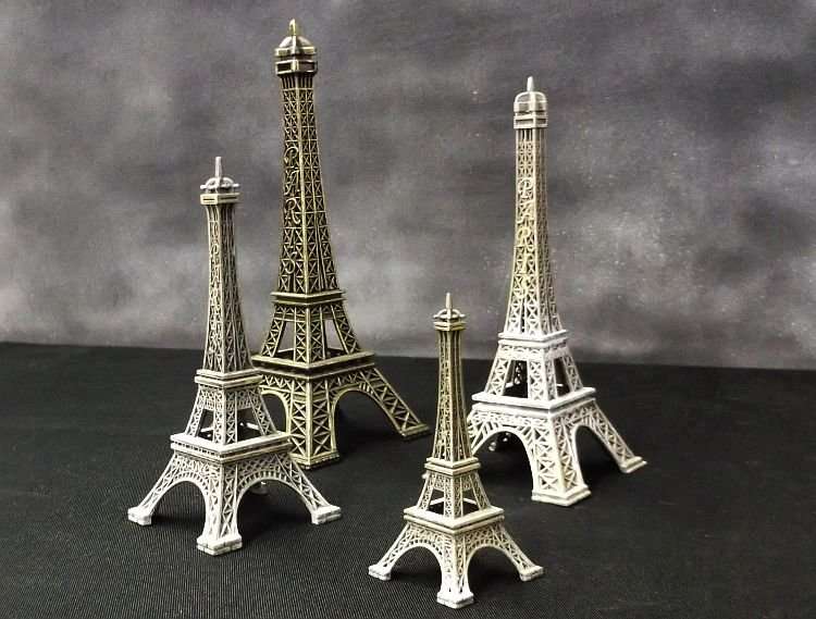 4 EXCEPTIONALLY COOL EIFFEL TOWER METAL ORNAMENTS ...10 TO 22 CM ....BID AS A LOT !!!!!!!!