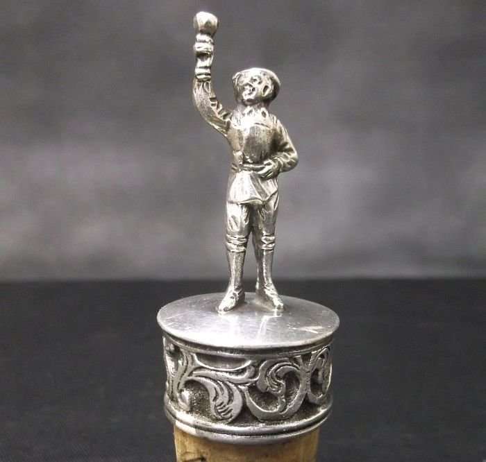 A CHARMING VINTAGE DETAILED CORK HOLDER WITH SILVER CONTENT ...MARKED 90%...LOOKS DUTCH