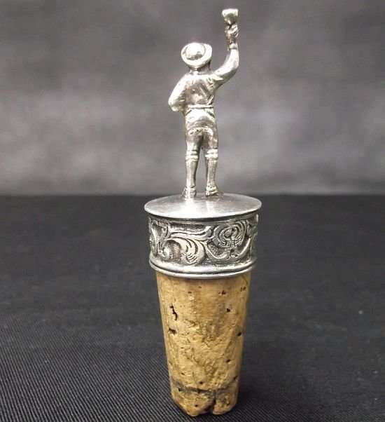 A CHARMING VINTAGE DETAILED CORK HOLDER WITH SILVER CONTENT ...MARKED 90%...LOOKS DUTCH
