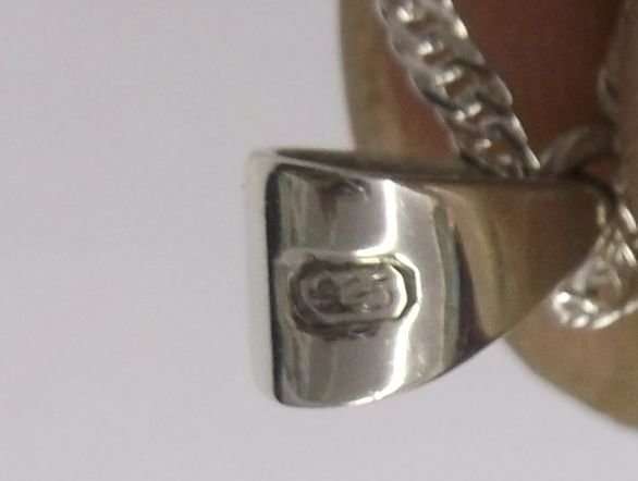 A LOVELY NEW STERLING SILVER NECKLACE WITH AN OLD STERLING SILVER PENDANT SET WITH A SILVER TICKEY !