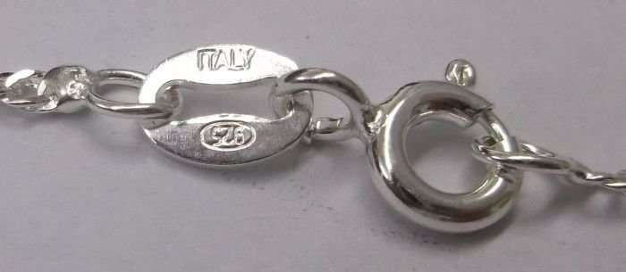 A LOVELY NEW STERLING SILVER NECKLACE WITH AN OLD STERLING SILVER PENDANT SET WITH A SILVER TICKEY !