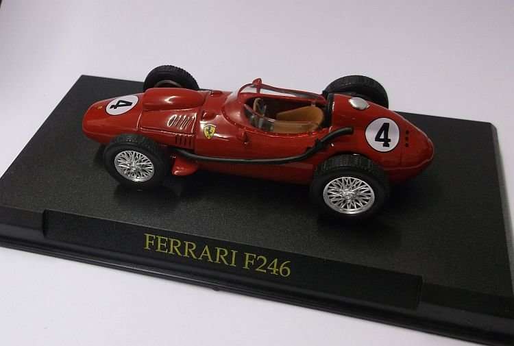 A BEAUTIFULLY DETAILED DIE CAST METAL MODEL OF THE FERRARI F246 ...WITH DISPLAY BASE...WOW !!!