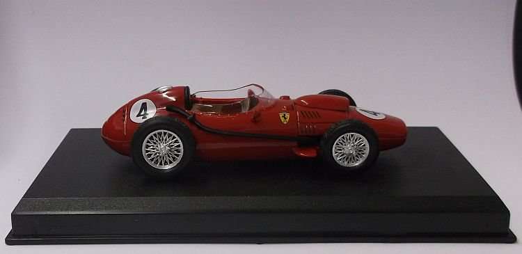 A BEAUTIFULLY DETAILED DIE CAST METAL MODEL OF THE FERRARI F246 ...WITH DISPLAY BASE...WOW !!!