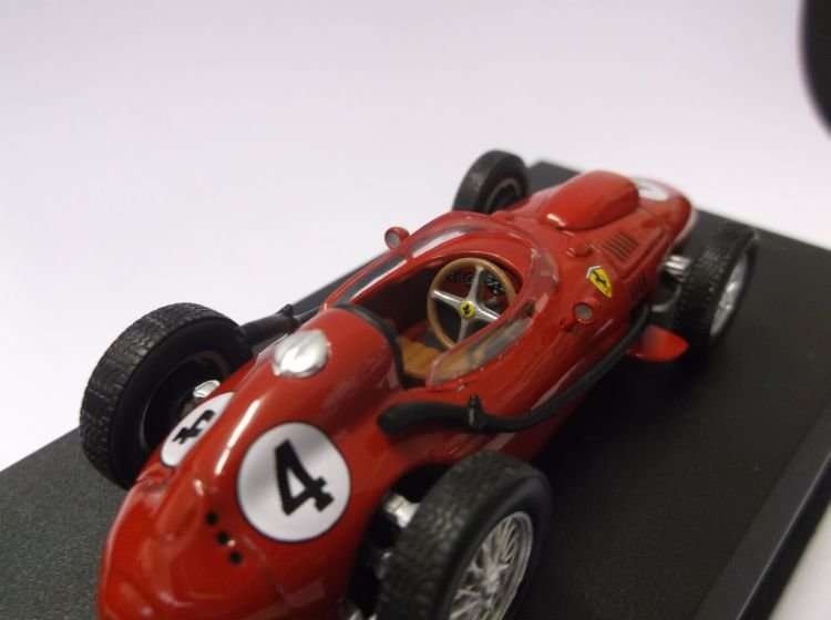 A BEAUTIFULLY DETAILED DIE CAST METAL MODEL OF THE FERRARI F246 ...WITH DISPLAY BASE...WOW !!!